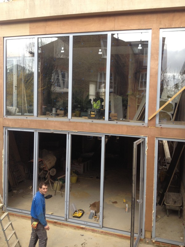 Aluminium bi-fold doors with two-storey glazing in Forest Hill