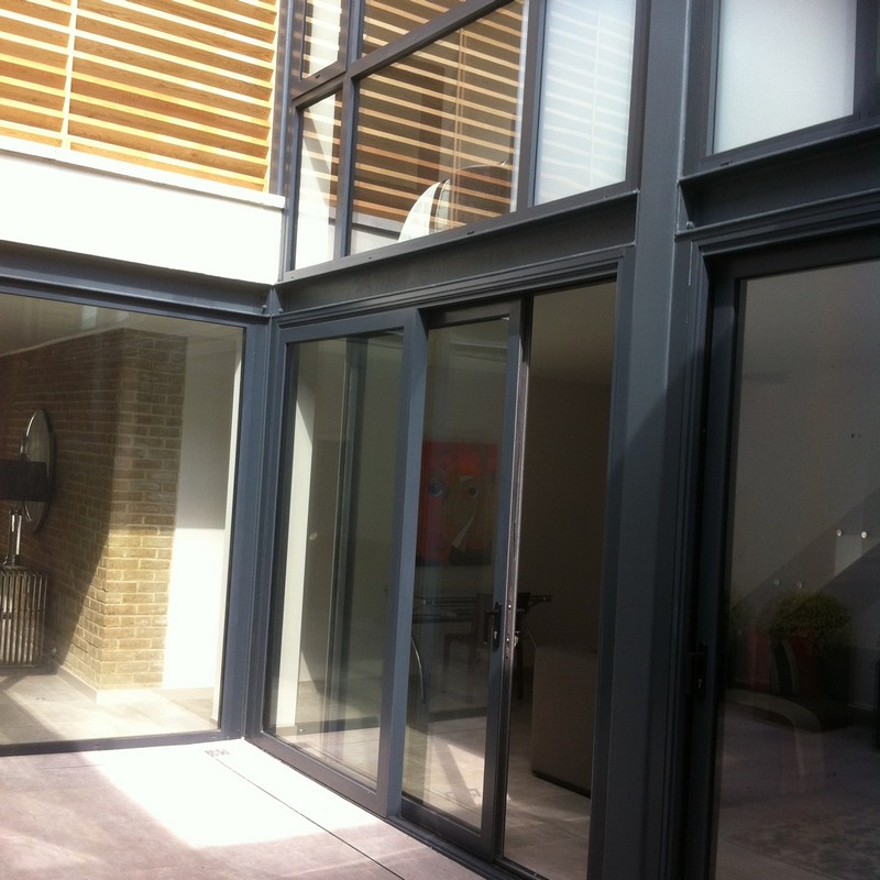 Anthracite aluminium sliding patio doors fitted in Forest Hill