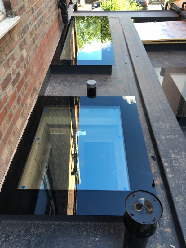 Multiple flat roof skylights on extension in Forest Hill